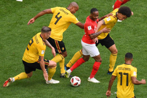 Belgium's defender Toby Alderweireld (L), Belgium's defender Vincent Kompany (2nd-L) and Belgium's midfielder Axel Witsel (R) vie for the ball with England's forward Raheem Sterling during their Russia 2018 World Cup play-off for third place football match between Belgium and England at the Saint Petersburg Stadium in Saint Petersburg on July 14, 2018. / AFP PHOTO / OLGA MALTSEVA / RESTRICTED TO EDITORIAL USE - NO MOBILE PUSH ALERTS/DOWNLOADS